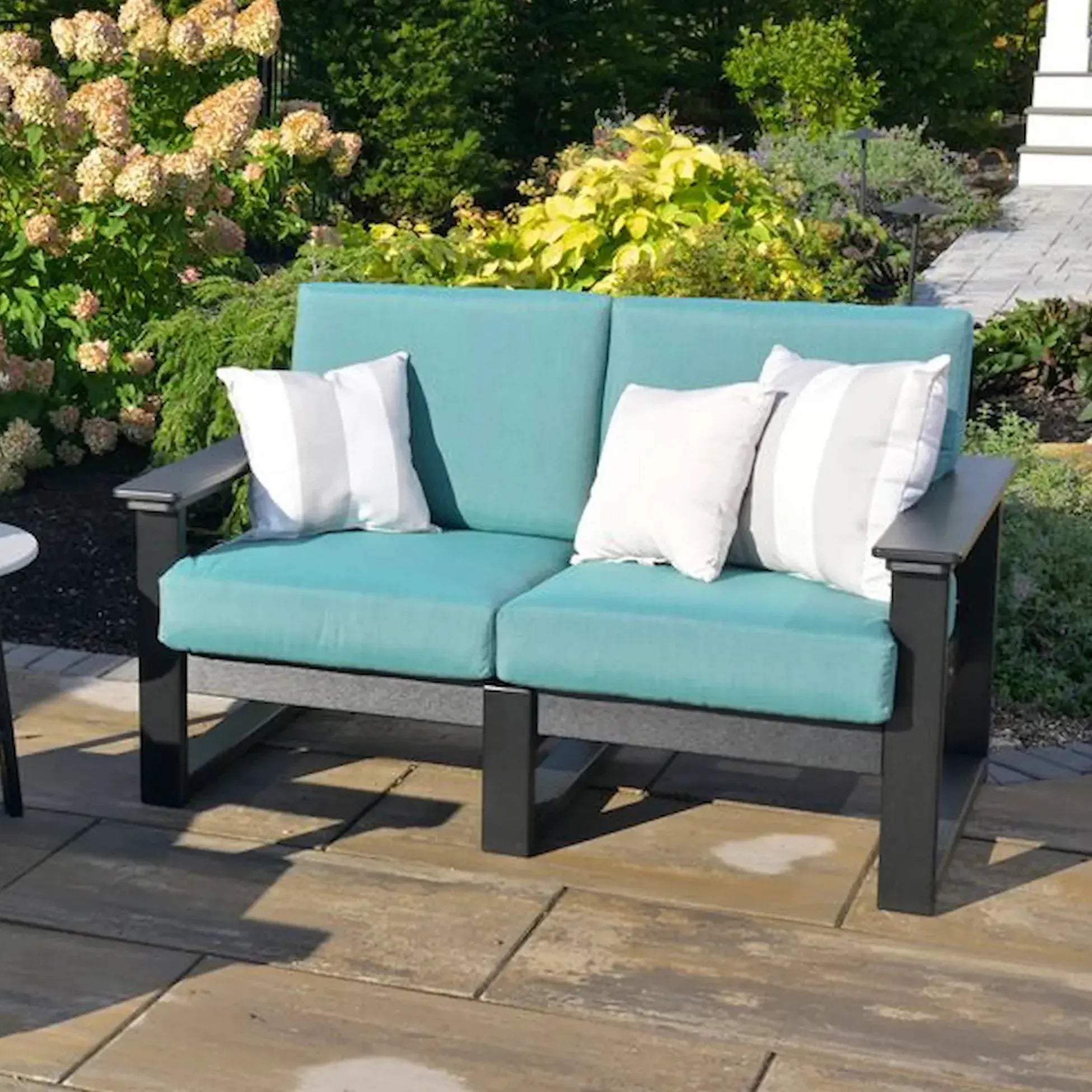 Lanai Loveseat in Black with Cast Breeze fabric