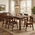 Pictured in Asbury Brown, with Monroe Side Dining Chair